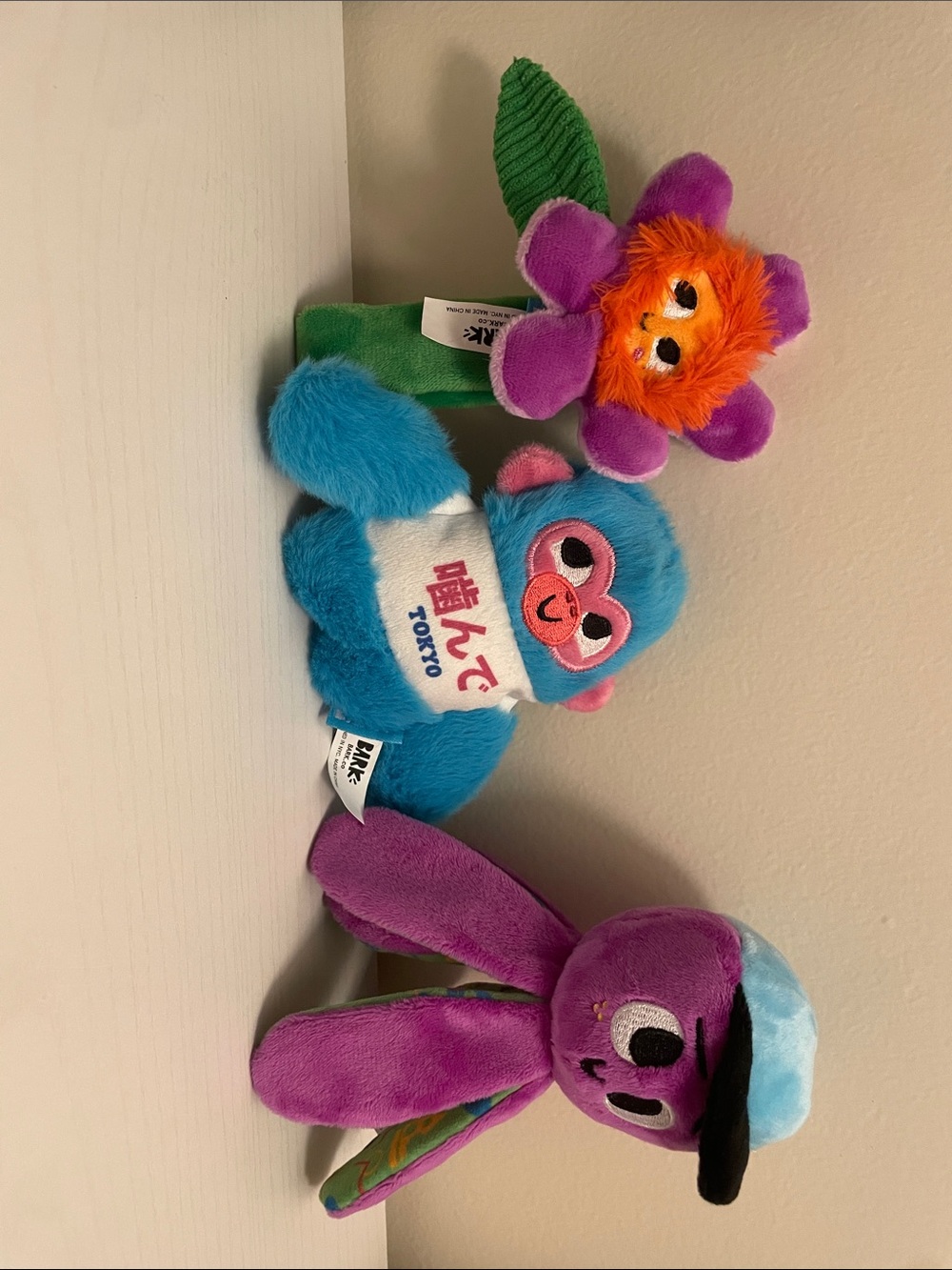 Purple and blue bark dog toys